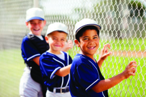 little kids playing baseball